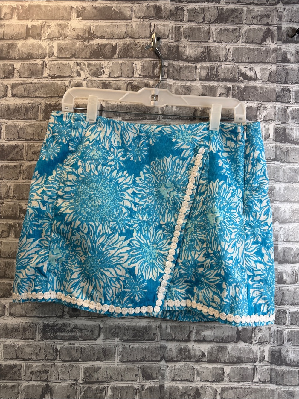 Lilly Pulitzer Turquoise Floral skorts with White Pom Trim